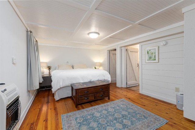4860 Horse Cove Rd, Highlands, NC 28741 - bedroom featuring heating unit, wood finished floors, and baseboards