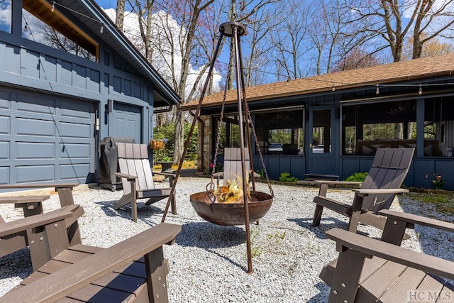 view of patio / terrace with a garage