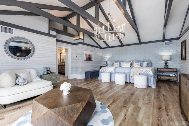 living room featuring hardwood / wood-style flooring, an inviting chandelier, high vaulted ceiling, and beamed ceiling