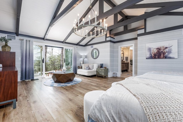 bedroom featuring hardwood / wood-style flooring, access to exterior, high vaulted ceiling, connected bathroom, and beamed ceiling