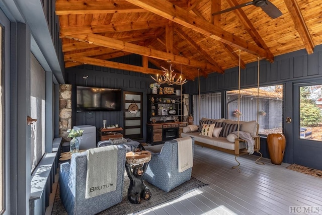 living room with wood ceiling, wood-type flooring, high vaulted ceiling, and beamed ceiling