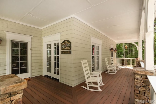 wooden deck featuring a porch