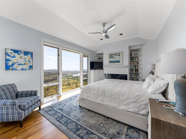 199 Mills Creek Point Rd, Lake Toxaway, NC 28747 - bedroom with a ceiling fan, vaulted ceiling, wood finished floors, and access to exterior