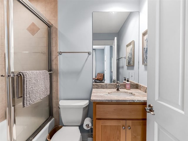 199 Mills Creek Point Rd, Lake Toxaway, NC 28747 - bathroom featuring vanity, combined bath / shower with glass door, and toilet