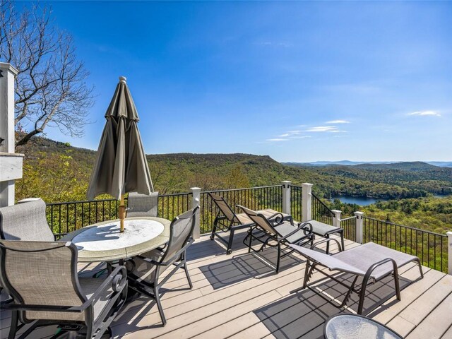 199 Mills Creek Point Rd, Lake Toxaway, NC 28747 - deck featuring a water and mountain view and a wooded view