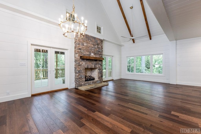 unfurnished living room with french doors, beam ceiling, high vaulted ceiling, dark hardwood / wood-style floors, and a fireplace