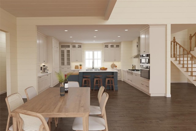 523 Broadview Dr, Highlands, NC 28741 - dining area with stairway, dark wood-style floors, and recessed lighting