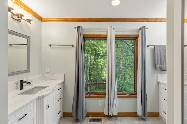 3398 Cullowhee Forest Rd, Cullowhee, NC 28723 - bathroom featuring vanity and ornamental molding