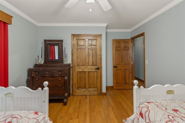 3398 Cullowhee Forest Rd, Cullowhee, NC 28723 - bedroom with wood finished floors, ornamental molding, and a ceiling fan