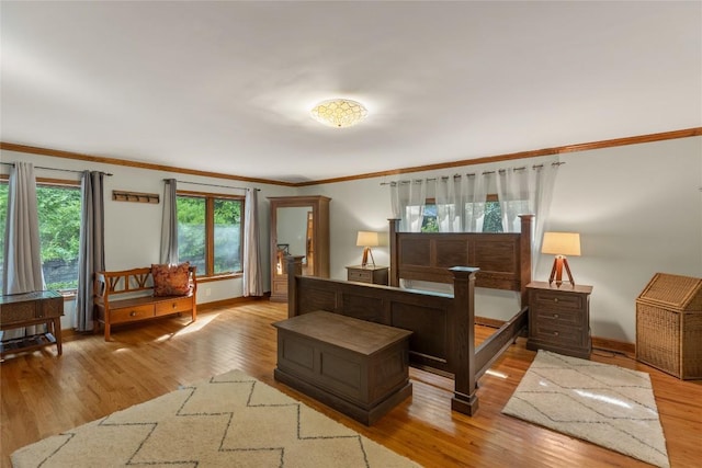 3398 Cullowhee Forest Rd, Cullowhee, NC 28723 - bedroom with wood finished floors and ornamental molding