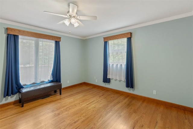3398 Cullowhee Forest Rd, Cullowhee, NC 28723 - empty room with light wood-style floors, ornamental molding, and a ceiling fan
