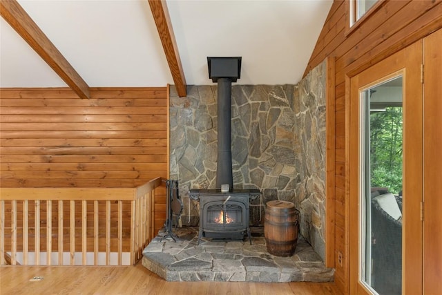 3398 Cullowhee Forest Rd, Cullowhee, NC 28723 - detailed view of a wood stove, wood finished floors, beamed ceiling, and wooden walls