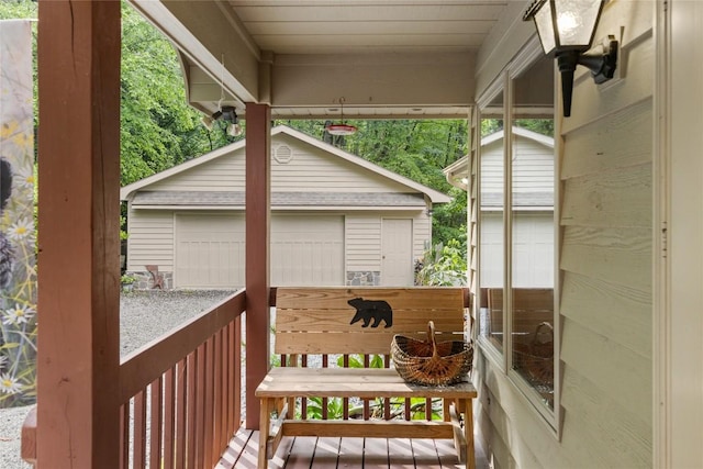 3398 Cullowhee Forest Rd, Cullowhee, NC 28723 - wooden deck featuring a detached garage and an outdoor structure
