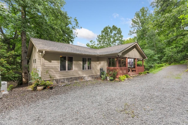 3398 Cullowhee Forest Rd, Cullowhee, NC 28723 - ranch-style house with driveway, a wooden deck, and a shingled roof