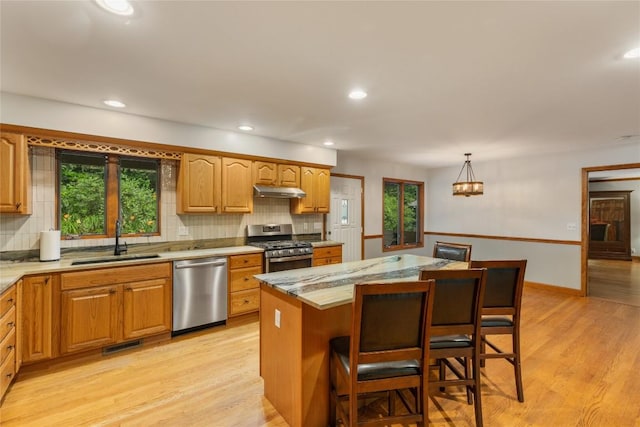 3398 Cullowhee Forest Rd, Cullowhee, NC 28723 - kitchen with stainless steel appliances, decorative backsplash, healthy amount of natural light, light wood finished floors, and recessed lighting