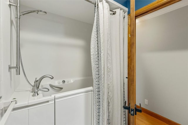 3398 Cullowhee Forest Rd, Cullowhee, NC 28723 - full bath with shower / bathtub combination with curtain and wood finished floors