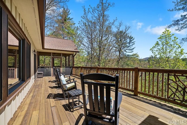 deck featuring a sunroom