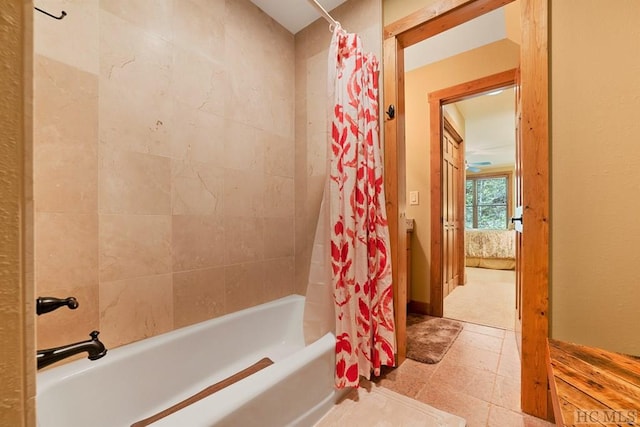 bathroom with shower / tub combo with curtain