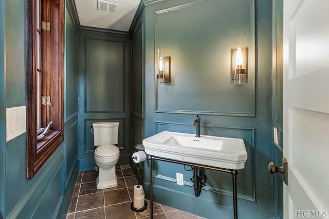 bathroom with sink and toilet