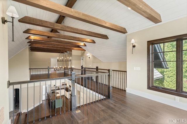 corridor featuring lofted ceiling with beams, dark wood-type flooring, and a notable chandelier