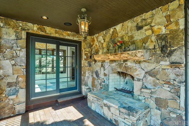 property entrance featuring a fireplace