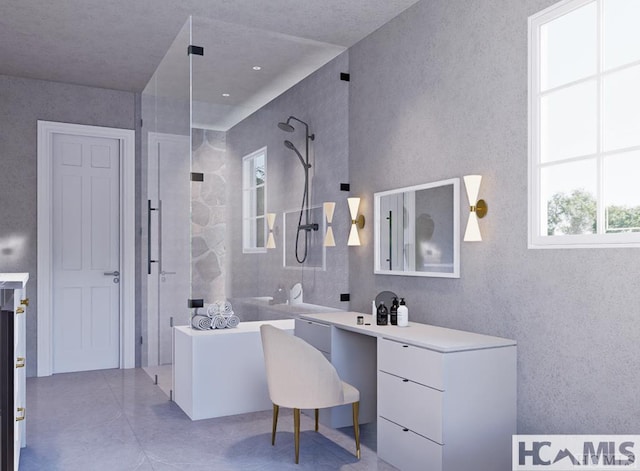 full bath with a shower, vanity, and a bath