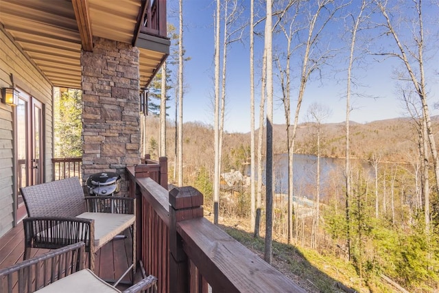 103 Southshore Dr Unit A1, Tuckasegee, NC 28783 - balcony with a view of trees