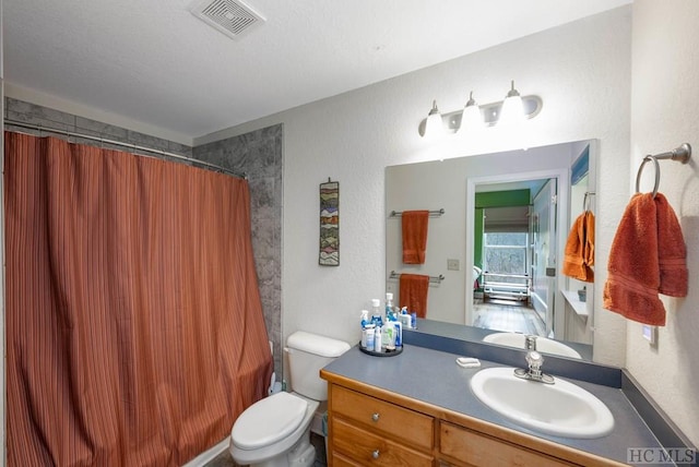 full bathroom with toilet, vanity, and shower / bath combination with curtain