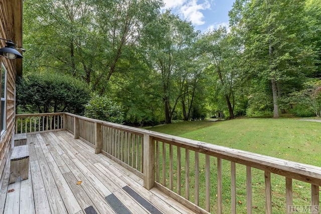 deck featuring a lawn