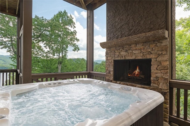 541 Summer Hill Rd, Cullowhee, NC 28723 - deck featuring a fireplace and a hot tub