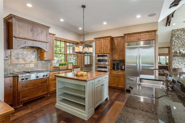 541 Summer Hill Rd, Cullowhee, NC 28723 - kitchen with appliances with stainless steel finishes, open shelves, wood counters, tasteful backsplash, and pendant lighting