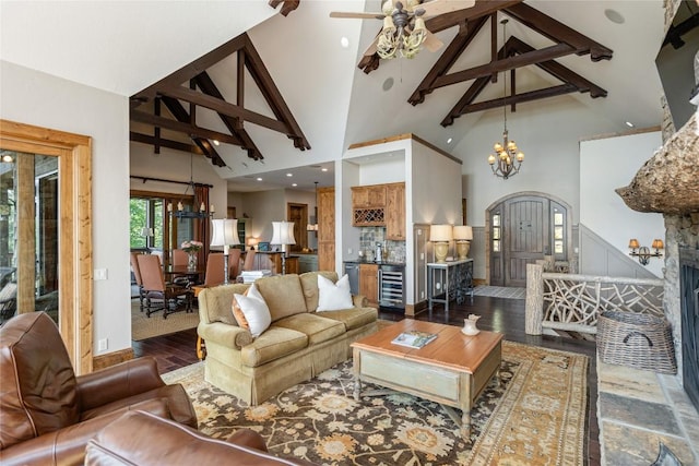 541 Summer Hill Rd, Cullowhee, NC 28723 - living area with a chandelier, beverage cooler, high vaulted ceiling, beamed ceiling, and wood finished floors