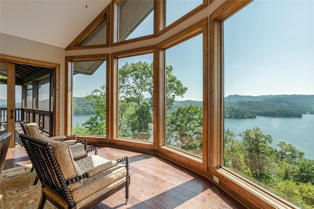 541 Summer Hill Rd, Cullowhee, NC 28723 - sunroom / solarium featuring a water and mountain view, lofted ceiling, and hardwood / wood-style flooring