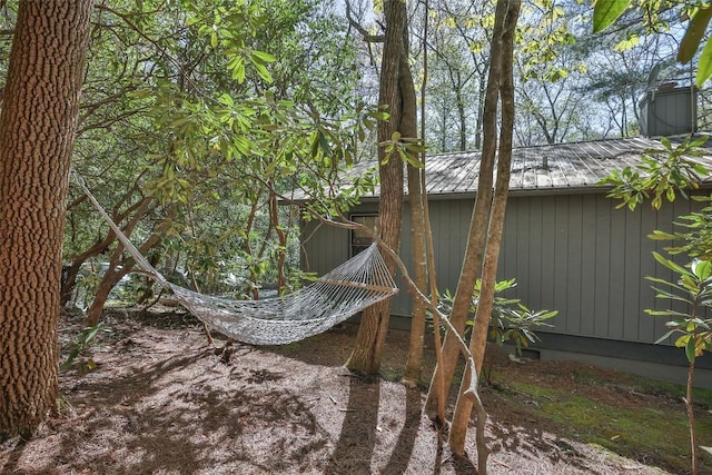 view of home's exterior with metal roof