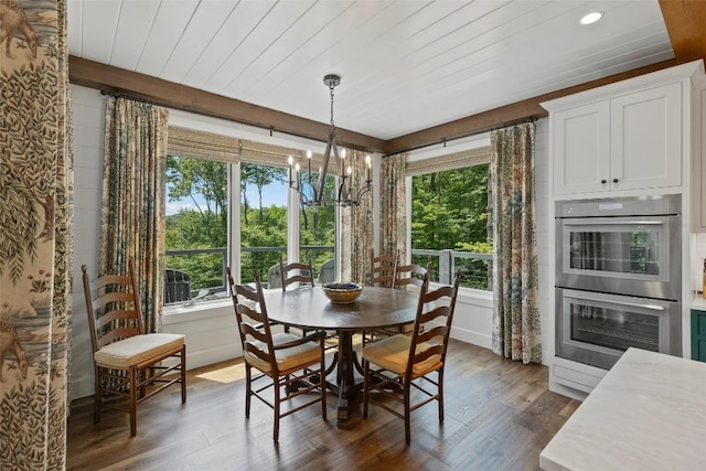 dining room featuring wooden ceiling, dark wood-type flooring, recessed lighting, and a notable chandelier