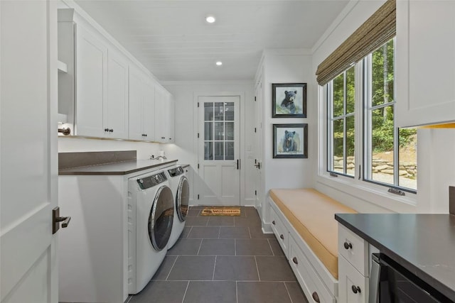 laundry area with cabinet space, crown molding, wine cooler, dark tile patterned floors, and washer and clothes dryer