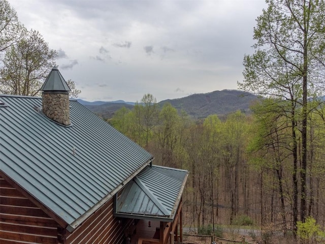 view of mountain feature with a wooded view
