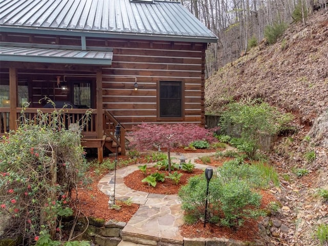 view of home's exterior featuring metal roof and a standing seam roof