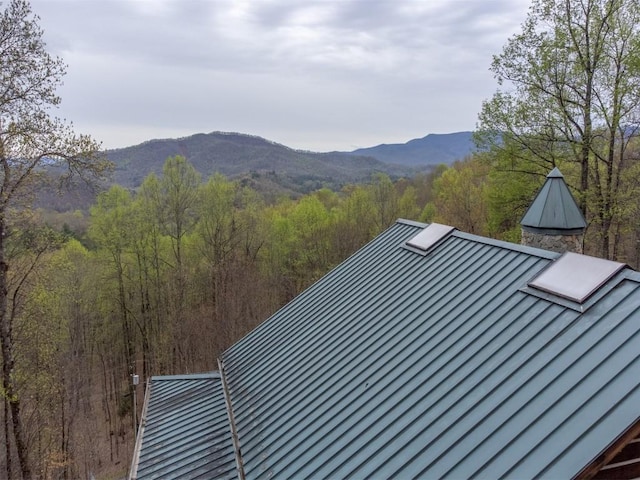 property view of mountains with a wooded view