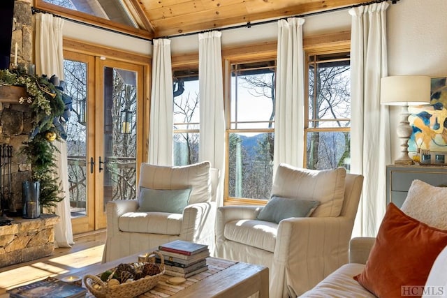 sunroom with wood ceiling and vaulted ceiling