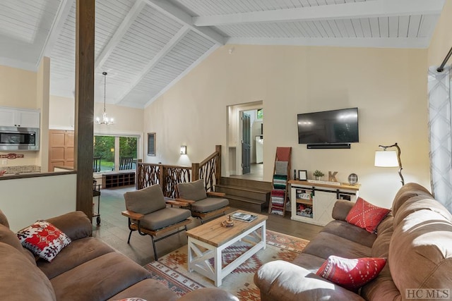 living room with a notable chandelier, beam ceiling, wood-type flooring, and high vaulted ceiling