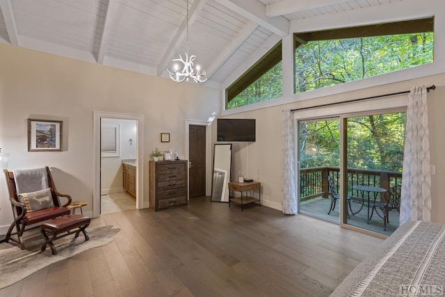 living area with hardwood / wood-style flooring, high vaulted ceiling, beam ceiling, and an inviting chandelier