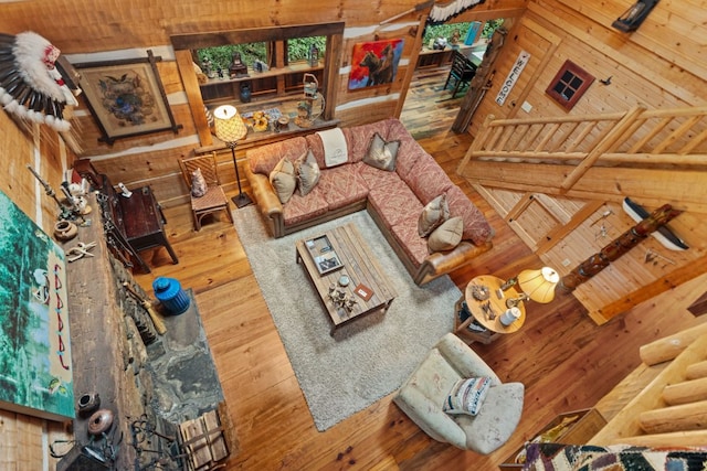 671 Walkingstick Rd, Highlands, NC 28741 - living area with wooden walls and hardwood / wood-style flooring