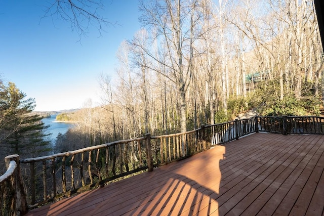 wooden terrace with a water view