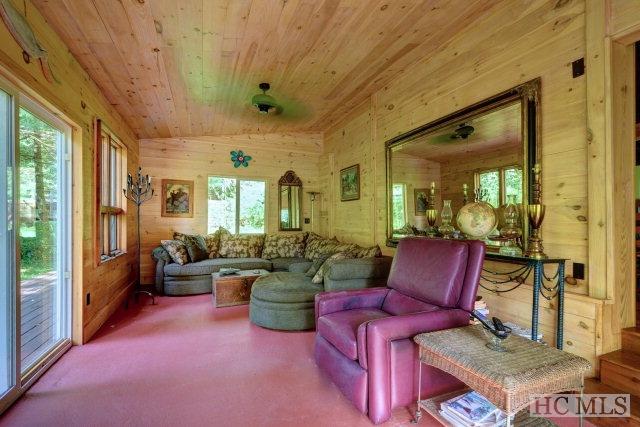 interior space with plenty of natural light, wooden ceiling, and vaulted ceiling