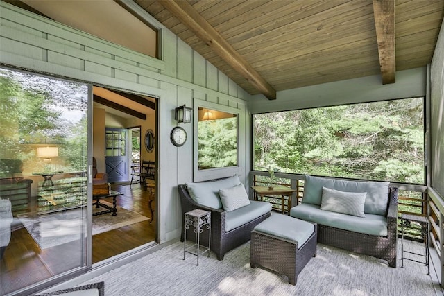 sunroom with wooden ceiling and vaulted ceiling with beams