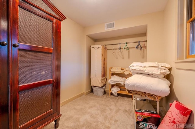 bedroom with light carpet