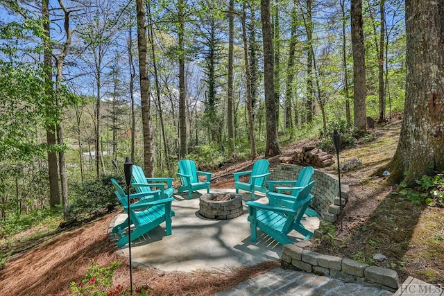 view of patio featuring a fire pit