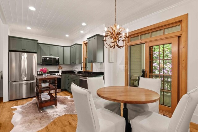 60 Glassy Vw, Cashiers, NC 28717 - dining room featuring a chandelier, crown molding, recessed lighting, and light wood-style floors