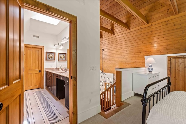 60 Glassy Vw, Cashiers, NC 28717 - bedroom with wood walls, wooden ceiling, and a sink